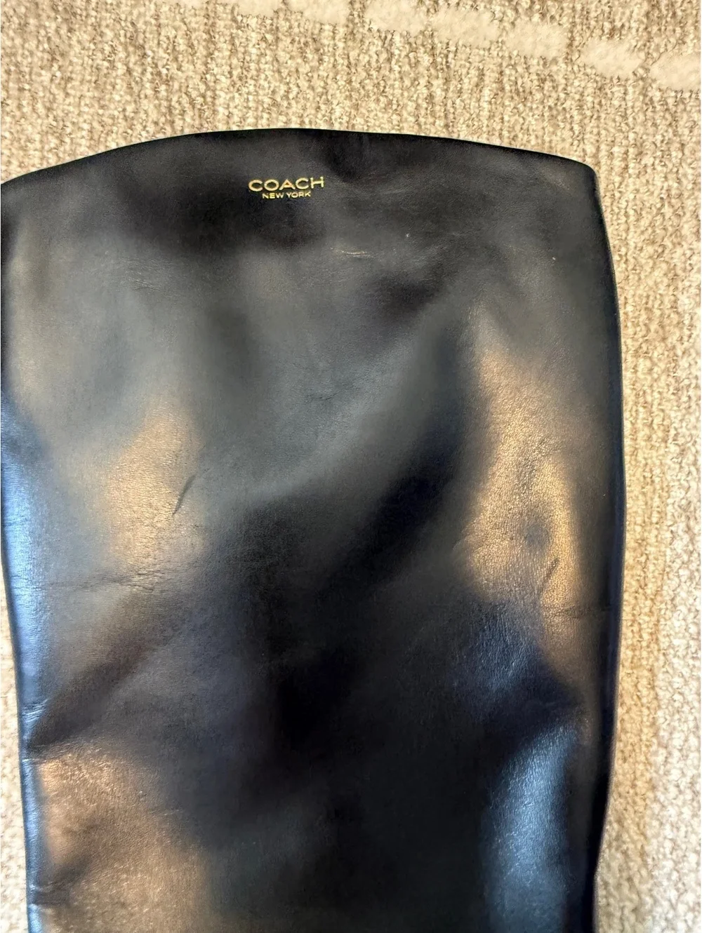 Coach scuffs practicality display
